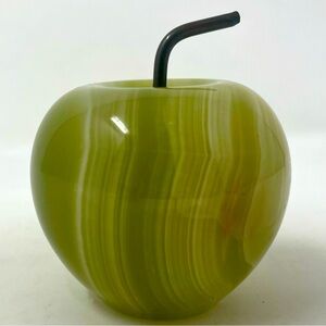 Carved stone alabaster green apple with metal stem.